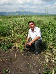 Javier with seedling