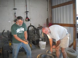 Dan and Steven Preparing Tires for Trailer