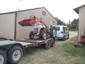 Reloading Tractor onto Mel's Trailer