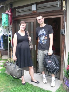 Laura and Dustin in front of their home in Fukuyama, Japan. Laura is on her way to walk to the clinic where she will give birth about two hours later