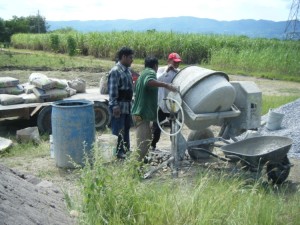 Getting ready to pour. Our modern implement - a cement mixer