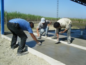 Nothing is very easy here, even with having the concrete delivered by truck. All still needs to be floated by hand