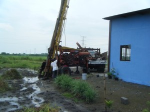 The drill rig is positioned and the tower raised