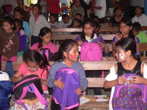The excitement of new backpacks and school supplies - "What did you get in yours?"