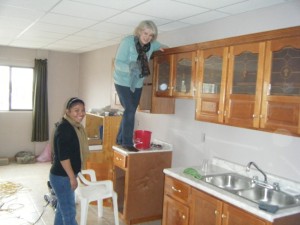 Now the cleaning work begins. Each of these jobs is also a mentoring opportunity for Theresa