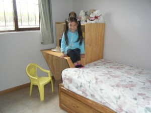 A very happy little girl. This is the first time that Ana has ever had her own bed, or her own room