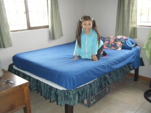 Little Ana shows off her mom and dad's new bedroom for the camera