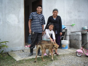 Armando, Alicia and Ana (with the infamous "dump-dog" Panchito) at the back entry to the Casa del Obrero staff house