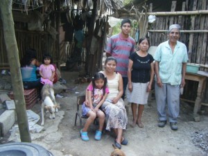 Armando with his grandparents at their village