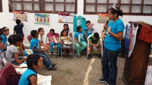 Alejandra teaching vacation Bible school at the little children's church in thier home