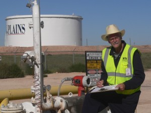 Steven (the beardless wonder) at the LACT meter ready to check in a new truck. Note the cool, Texan hard hat.