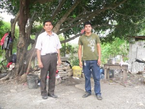 Armando and Javier stand under a tree in Armando's mother's yard. It was here where the first children's ministry was birthed in Buenos Aires