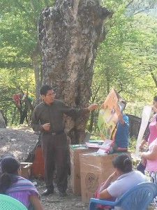 Javier teaching children and distributing Samaritan's Purse shoe boxes in an outreach into the Pame village of Milpas Viejas