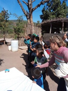These are Pame children learning to praise God with music.