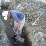 Javier digging trenches for the footers
