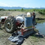 Our multi-use tractor and very useful pond