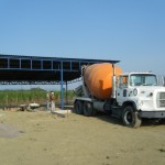 Cement truck ready to begin pouring the floor in the Galera-House