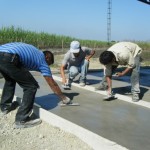 Nothing is very easy here, even with having the concrete delivered by truck. All still needs to be floated by hand