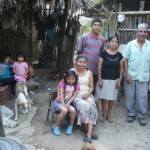 Armando with his grandparents at their village