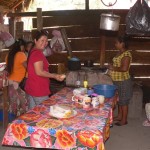 Hka Win with women in kitchen