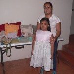 Woman and daughter at sewing school