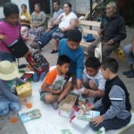 Outreach in Tanlacut with Samaritan’s Purse shoe boxes being given to the children