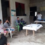 Dr. Mario Cázaers and his wife Alejandra teaching a group of Project LAMBS students in a village setting.