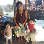 Poor children in Buenos Aires receiving food packages during coronavirus pandemic lock down.